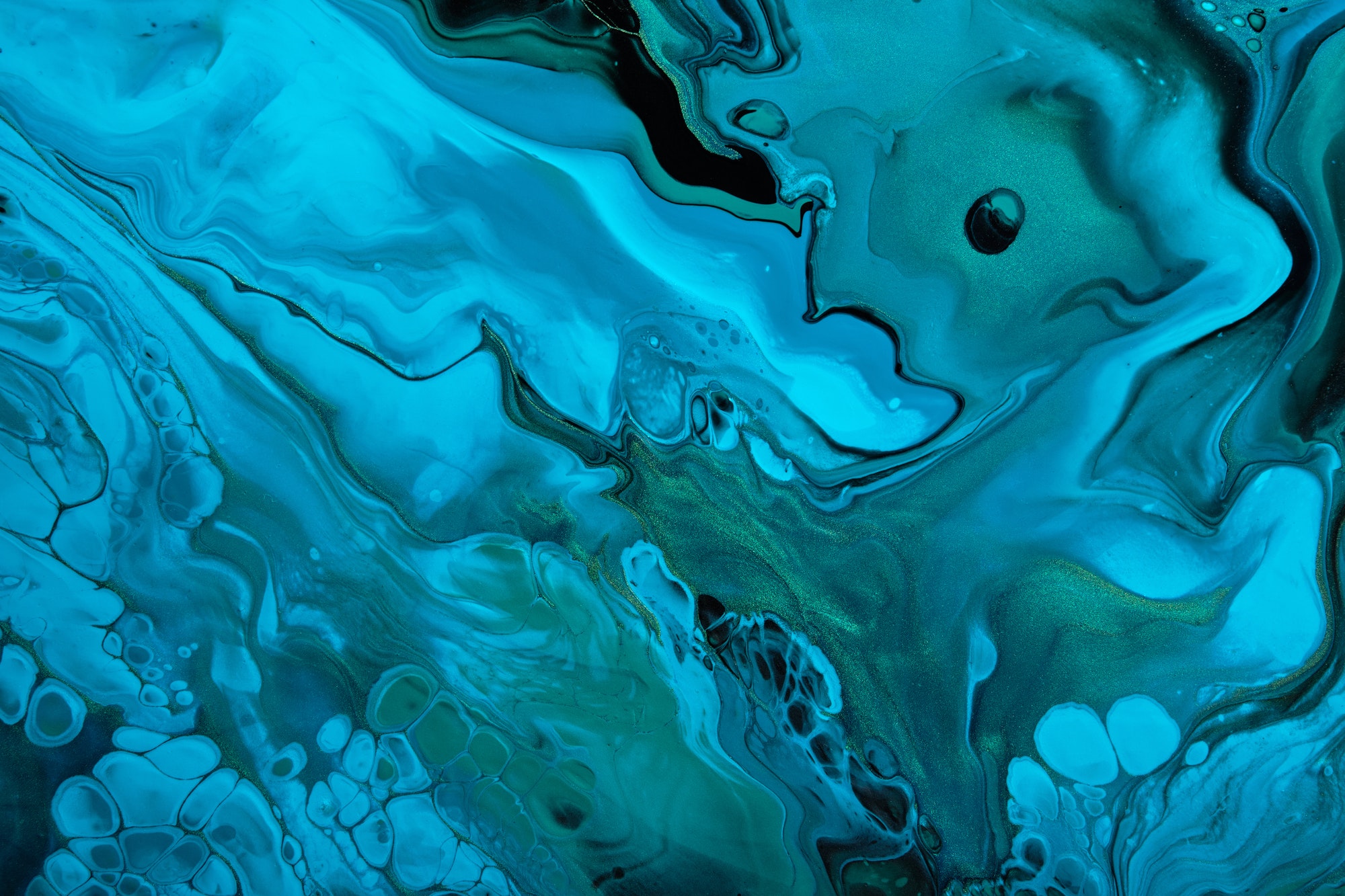 Fluid Art. Blue abstract wave swirls on black background. Marble effect background or texture
