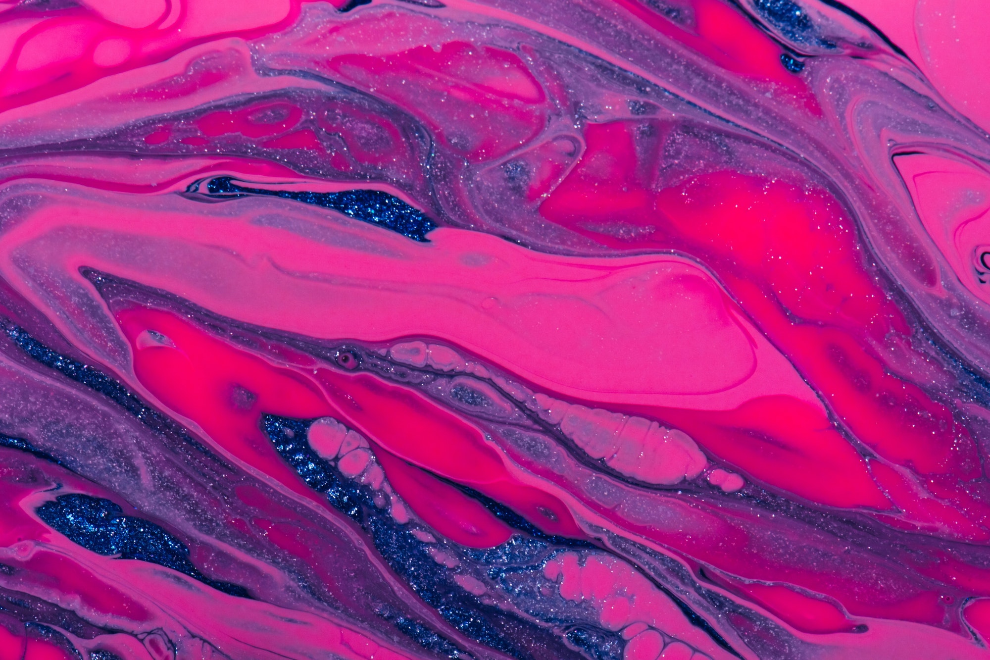 Fluid art texture. Abstract sparkling multicolor background.